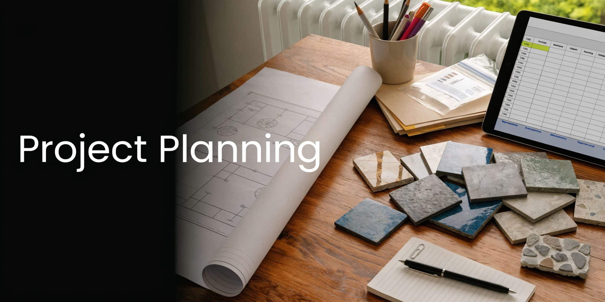 A professional project planning workspace with architectural blueprints, tile samples, a notebook, and a digital tablet.
